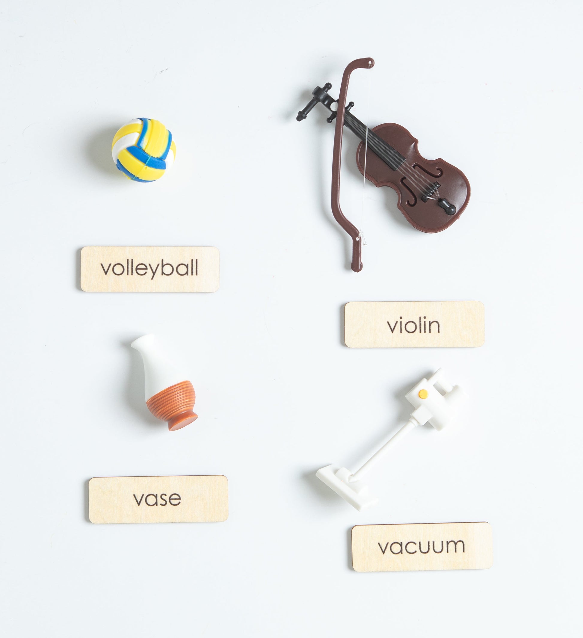 Montessori sound objects for letters Q to T in phonics activity set