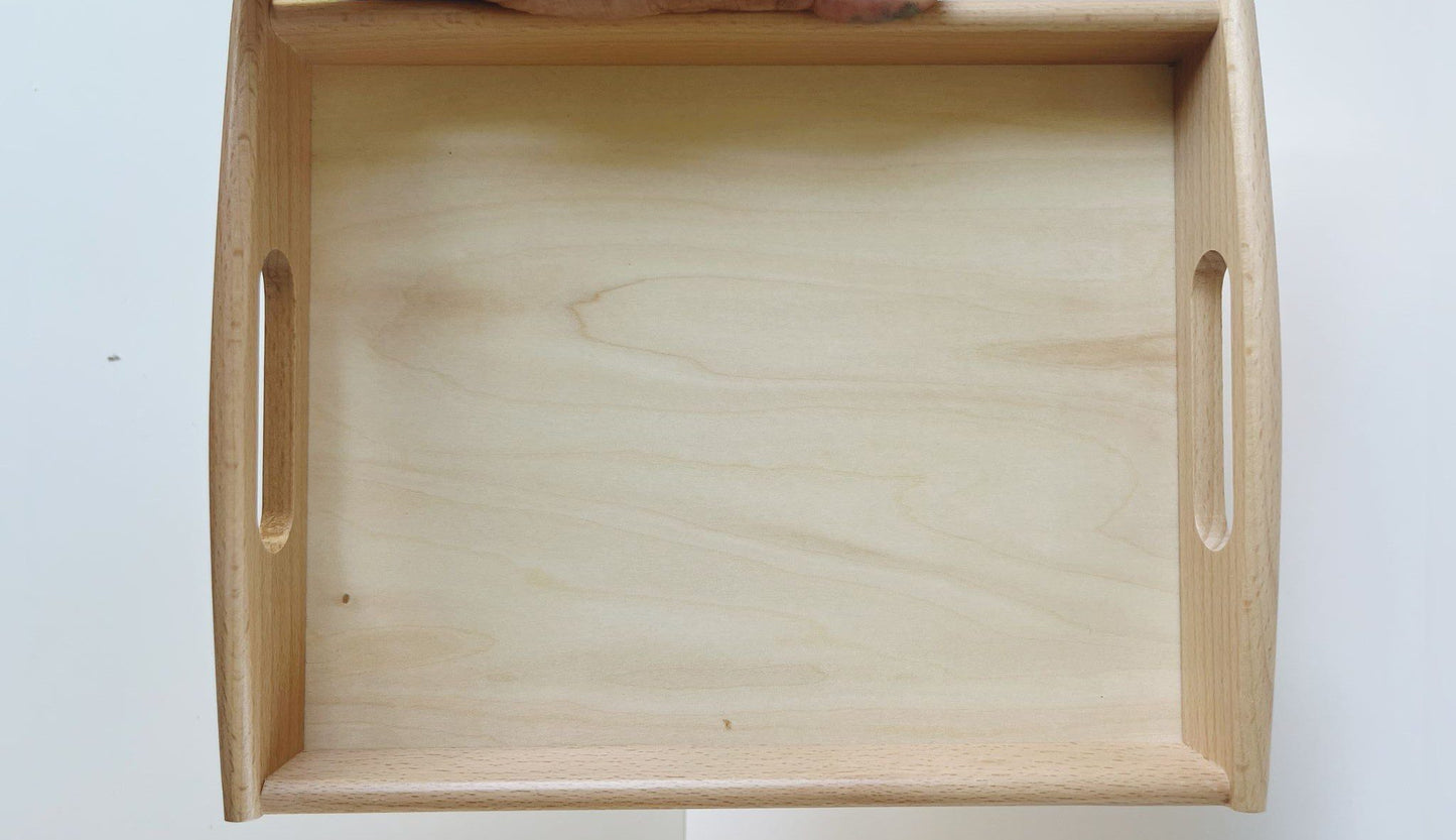 Angled view of Montessori wooden tray for classroom and home activities