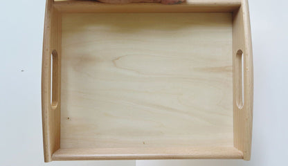 Angled view of Montessori wooden tray for classroom and home activities