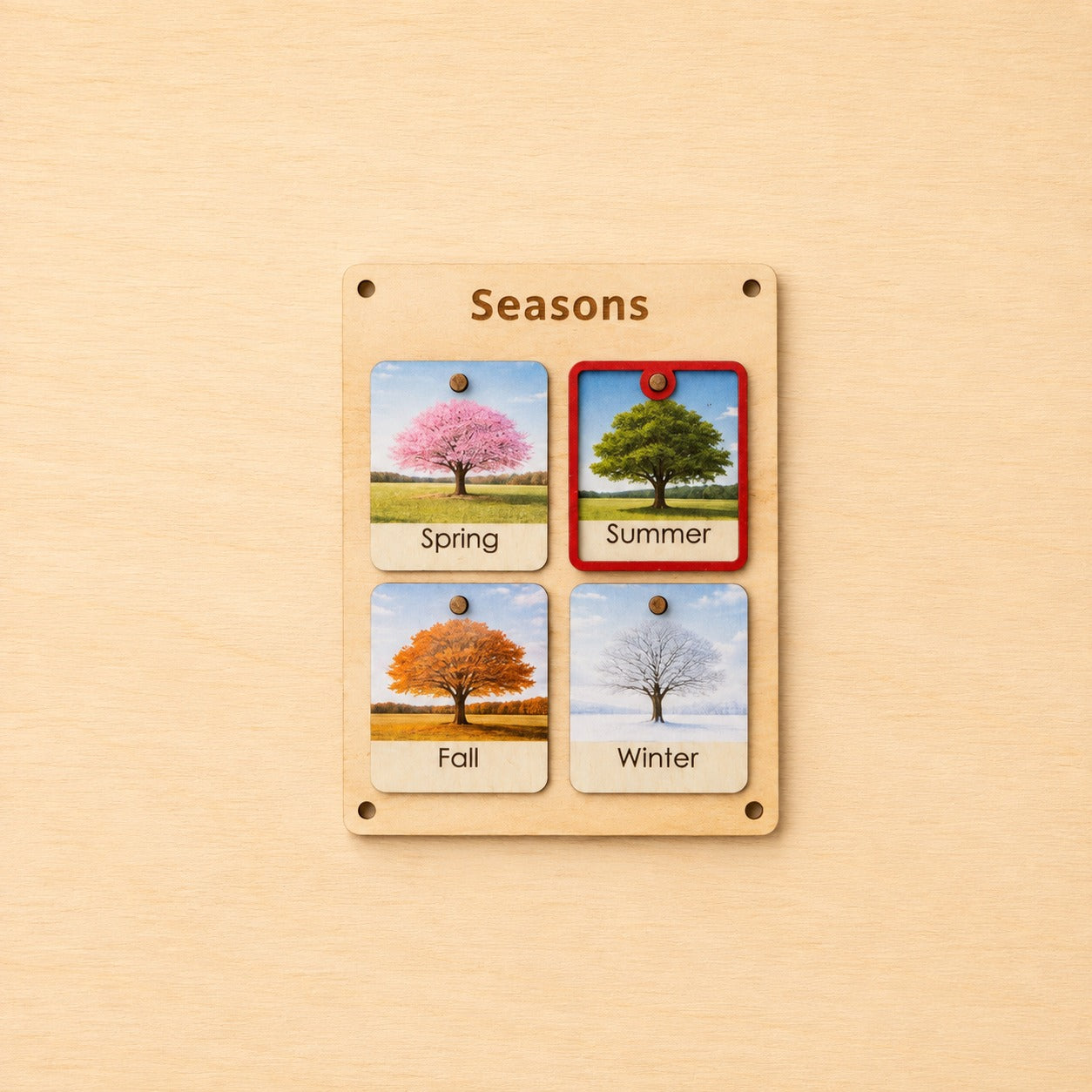 Montessori wooden seasons board with Spring, Summer, Fall and Winter cards