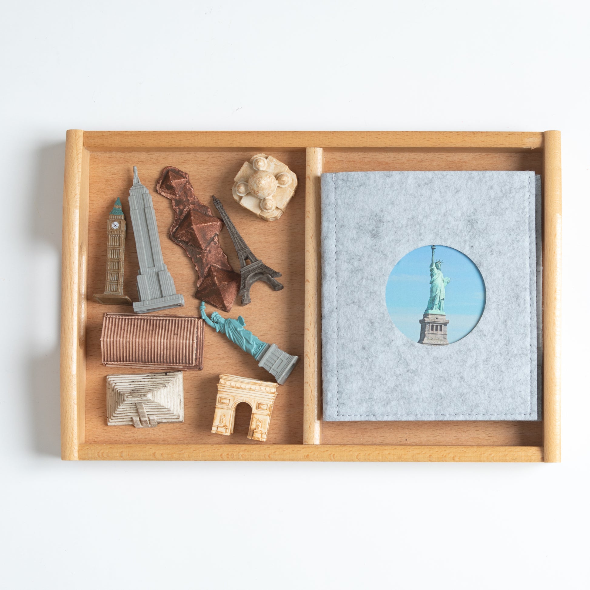 Montessori world landmarks mini objects matched with classified cards for hands-on geography learning