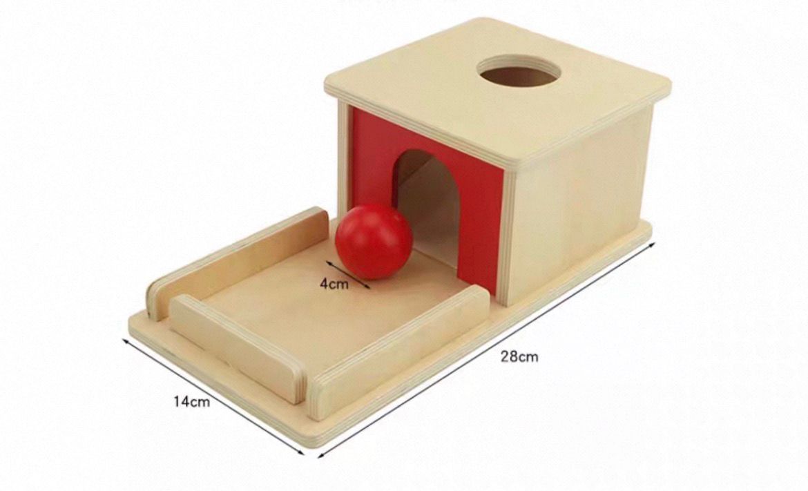 Montessori object permanence box with ball and attached tray 