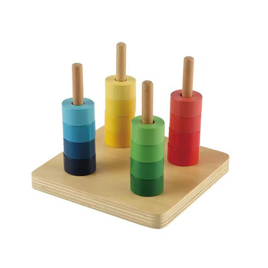 Montessori rainbow discs on four dowels  