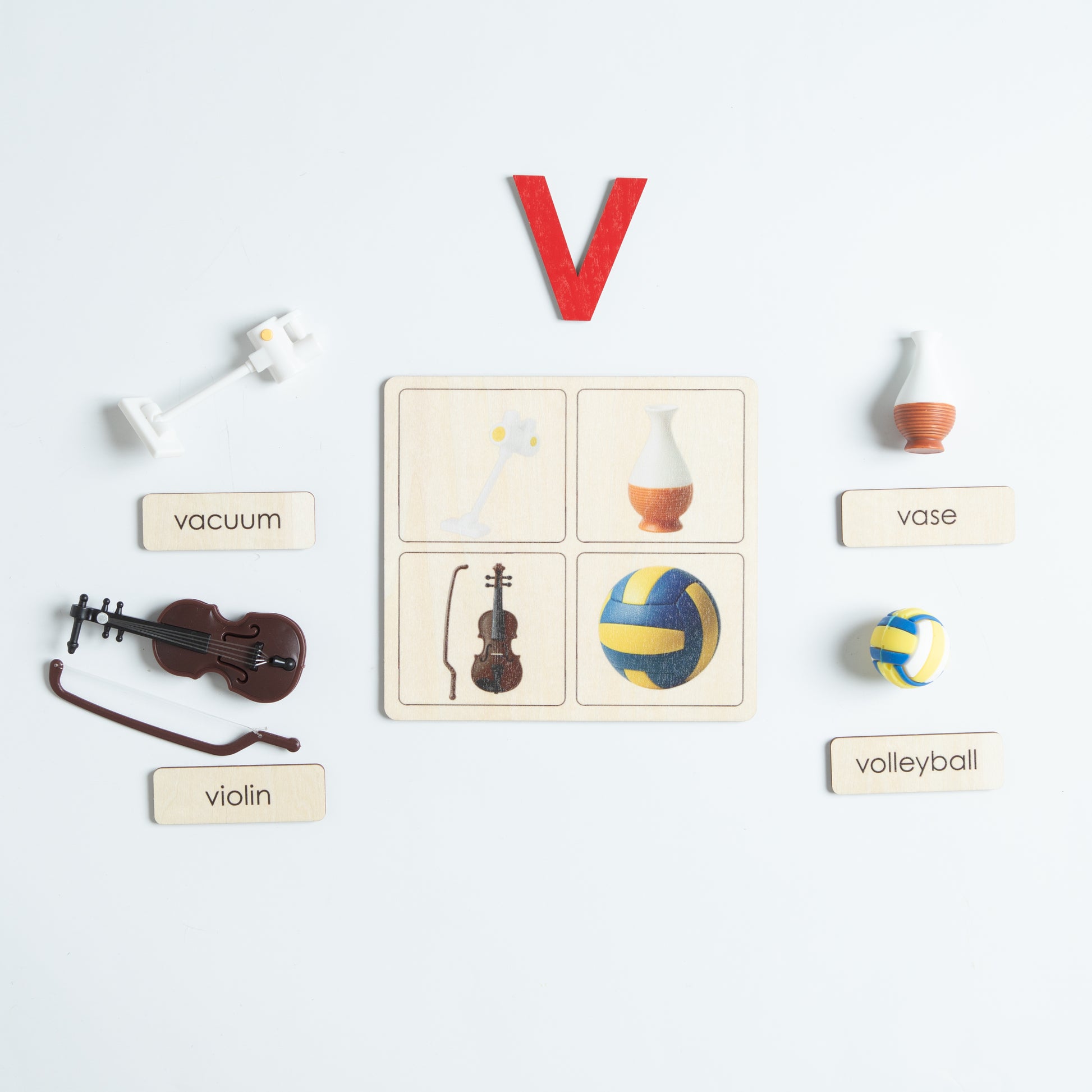 Montessori sound pouch for letter V with print card and phonics materials