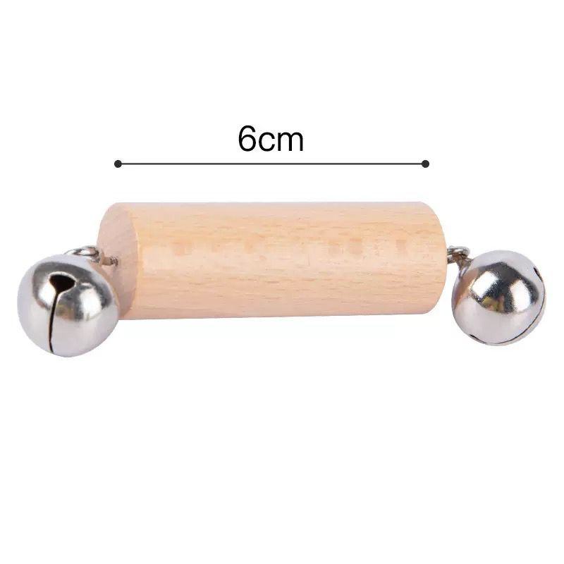 Wooden Montessori bell rattle toy with silver bells on both ends and a labeled 6 cm size measurement displayed above on a light background.