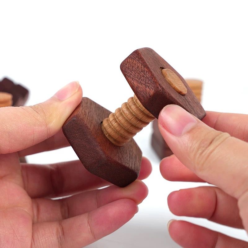 Montessori wooden nuts and screws activity for toddlers developing fine motor skills