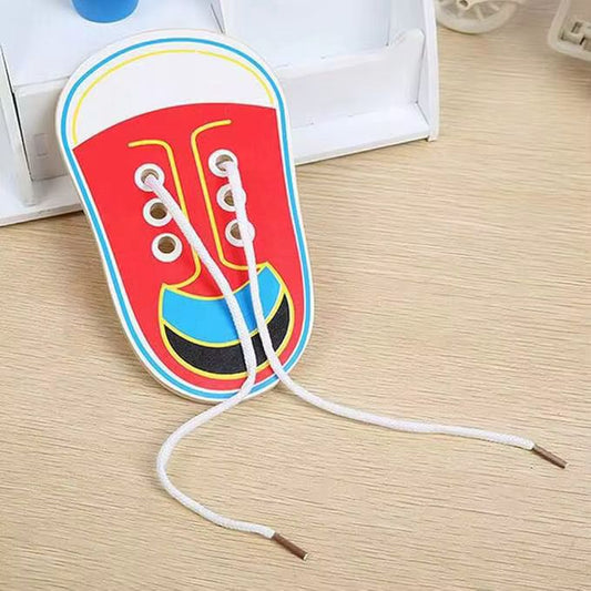 Wooden shoe lacing activity board used for practical life fine motor skill development and hand coordination